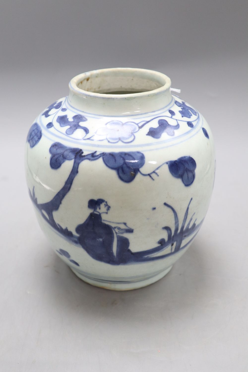 A Chinese Late Ming blue and white landscape jar, height 19cm, with certificate of authenticity, restored rim